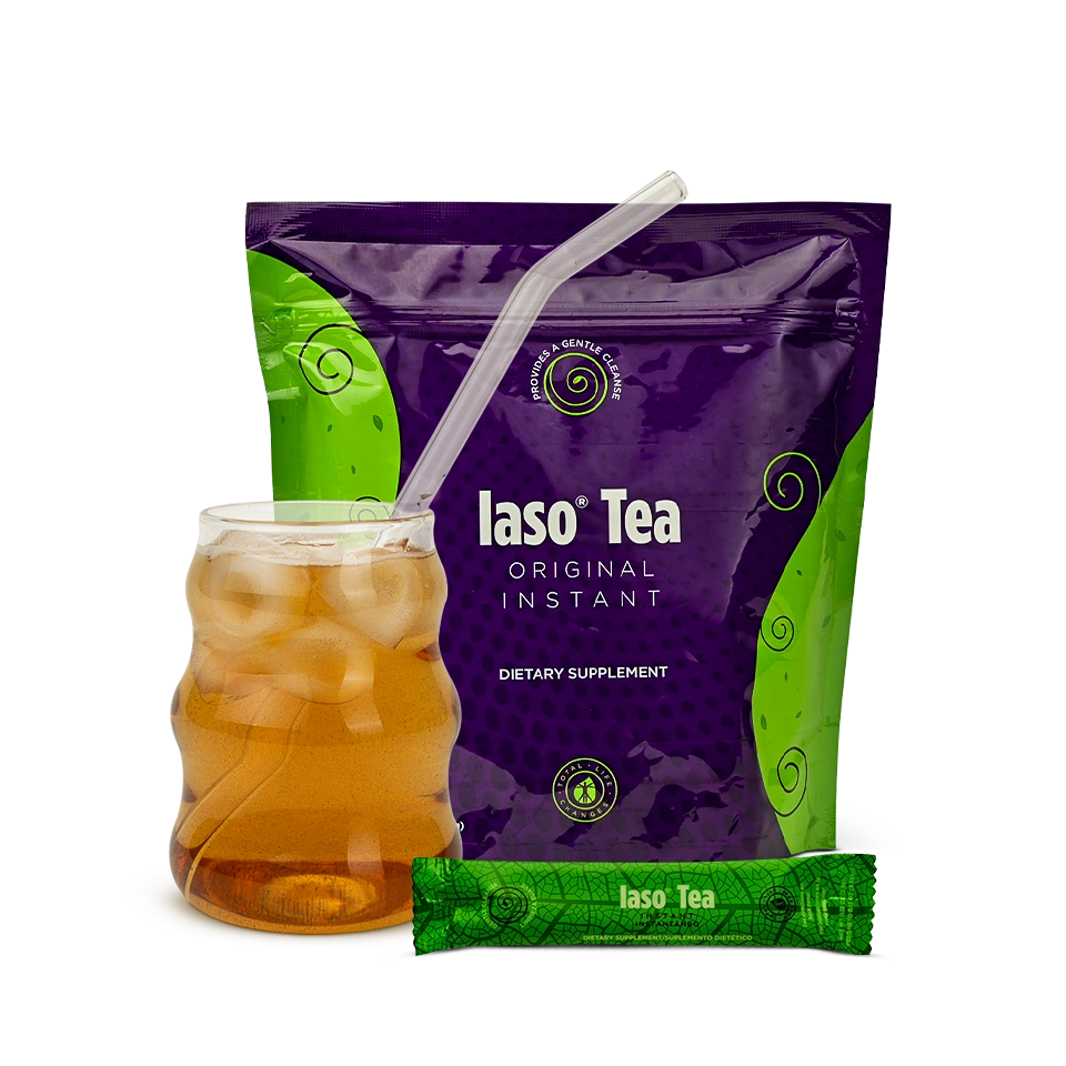 Glass if Iaso Instant Tea, bag, and sachet