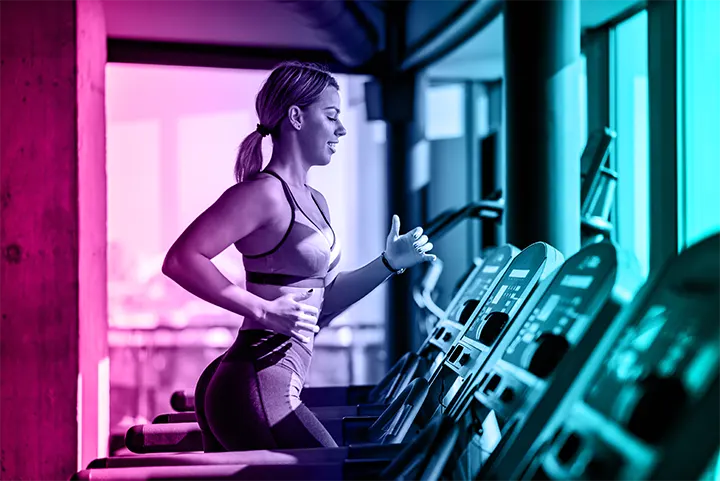 Women running on treadmill