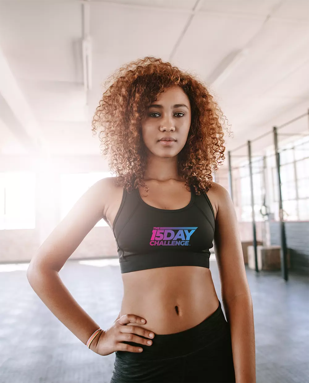 Woman on gym wearing 15 Day Challenge T-shirt